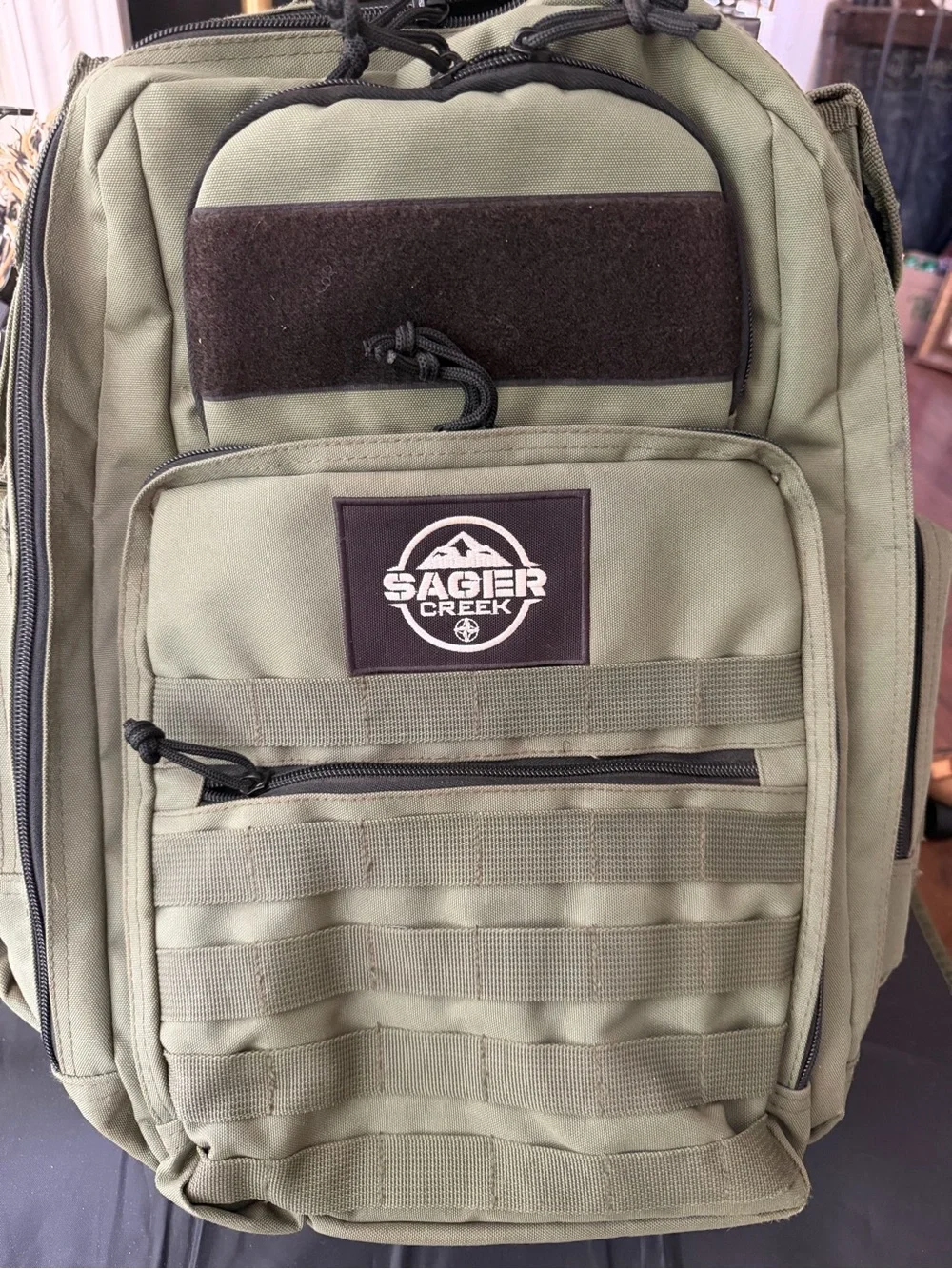 Tactical Olive Green Men's Diaper Bag Backpack by Sager Creek